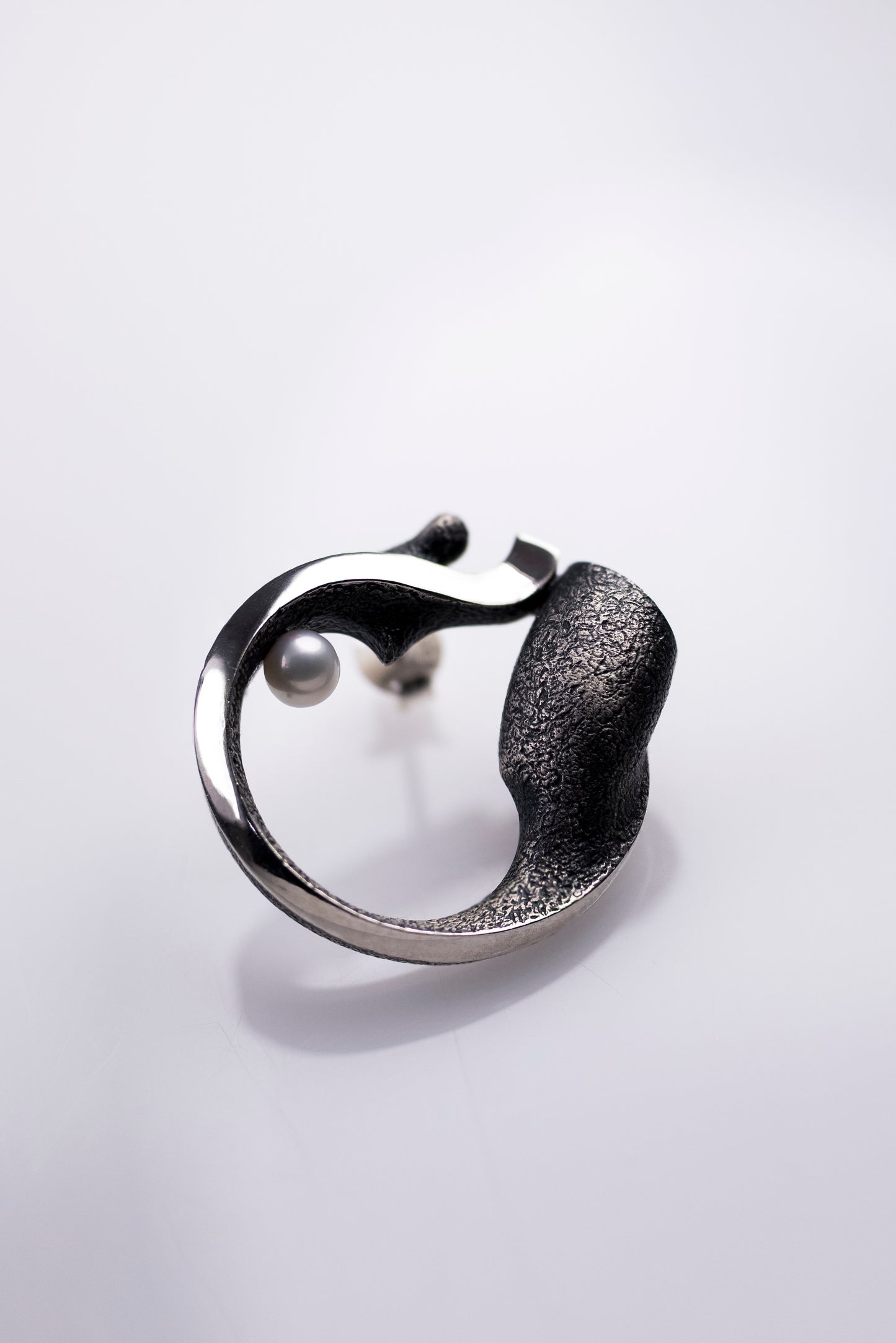Handcrafted oxidized silver earrings with pearls – feminine silhouettes