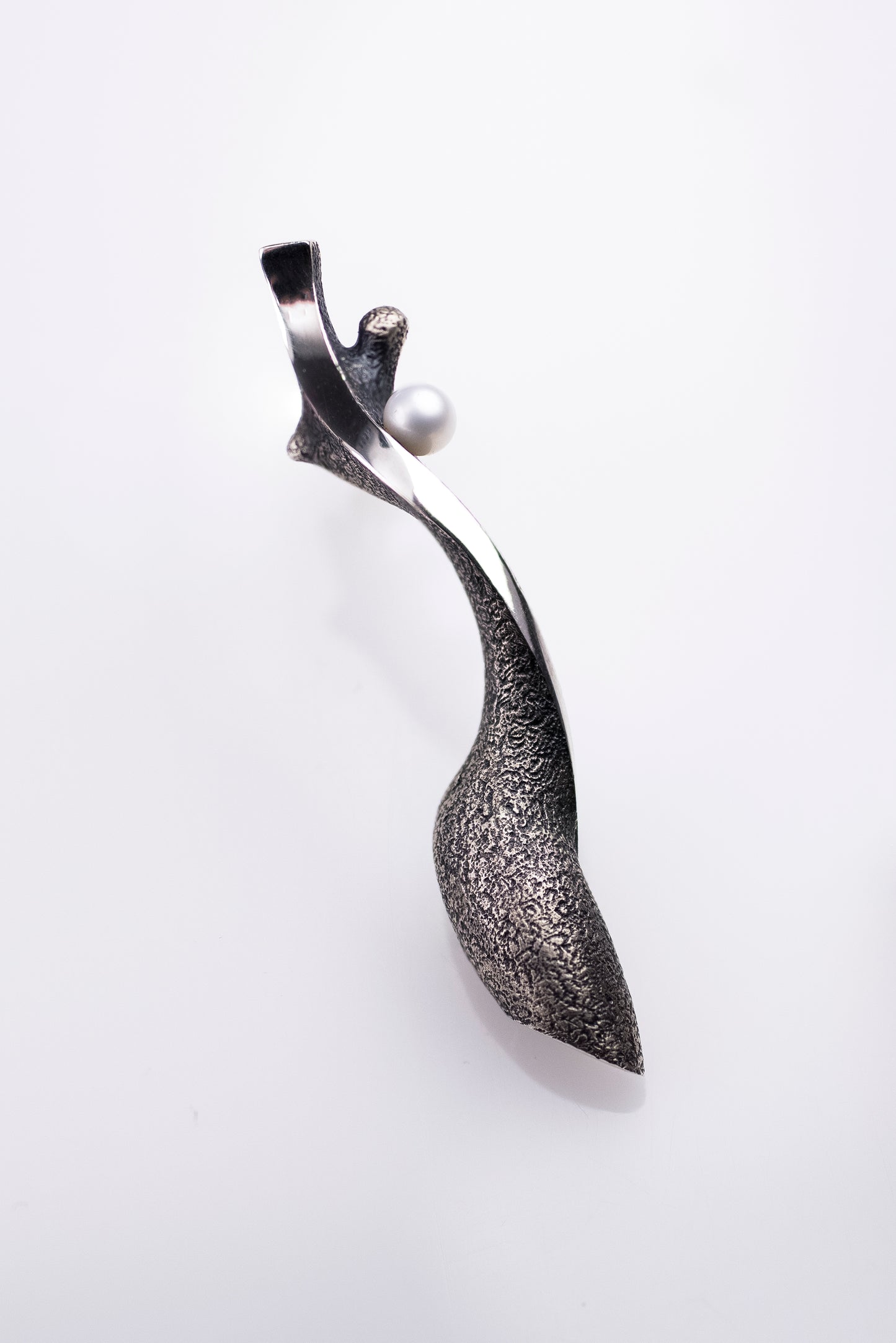 Handcrafted oxidized silver earrings with pearls – feminine silhouettes