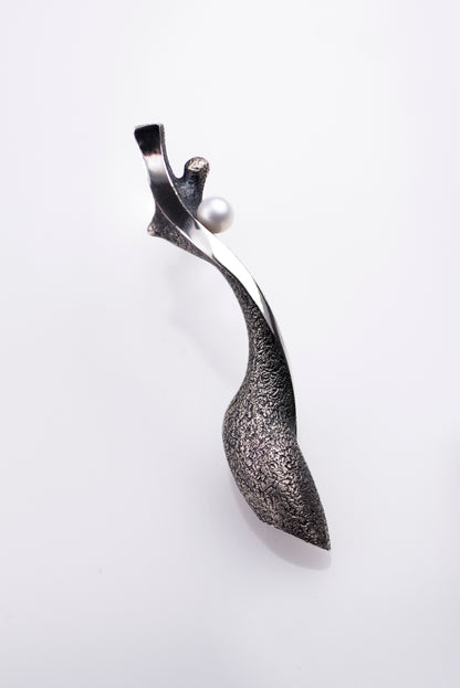 Handcrafted oxidized silver earrings with pearls – feminine silhouettes