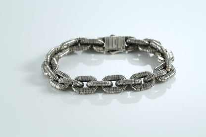 Sterling silver bracelet with textured links and anchor
