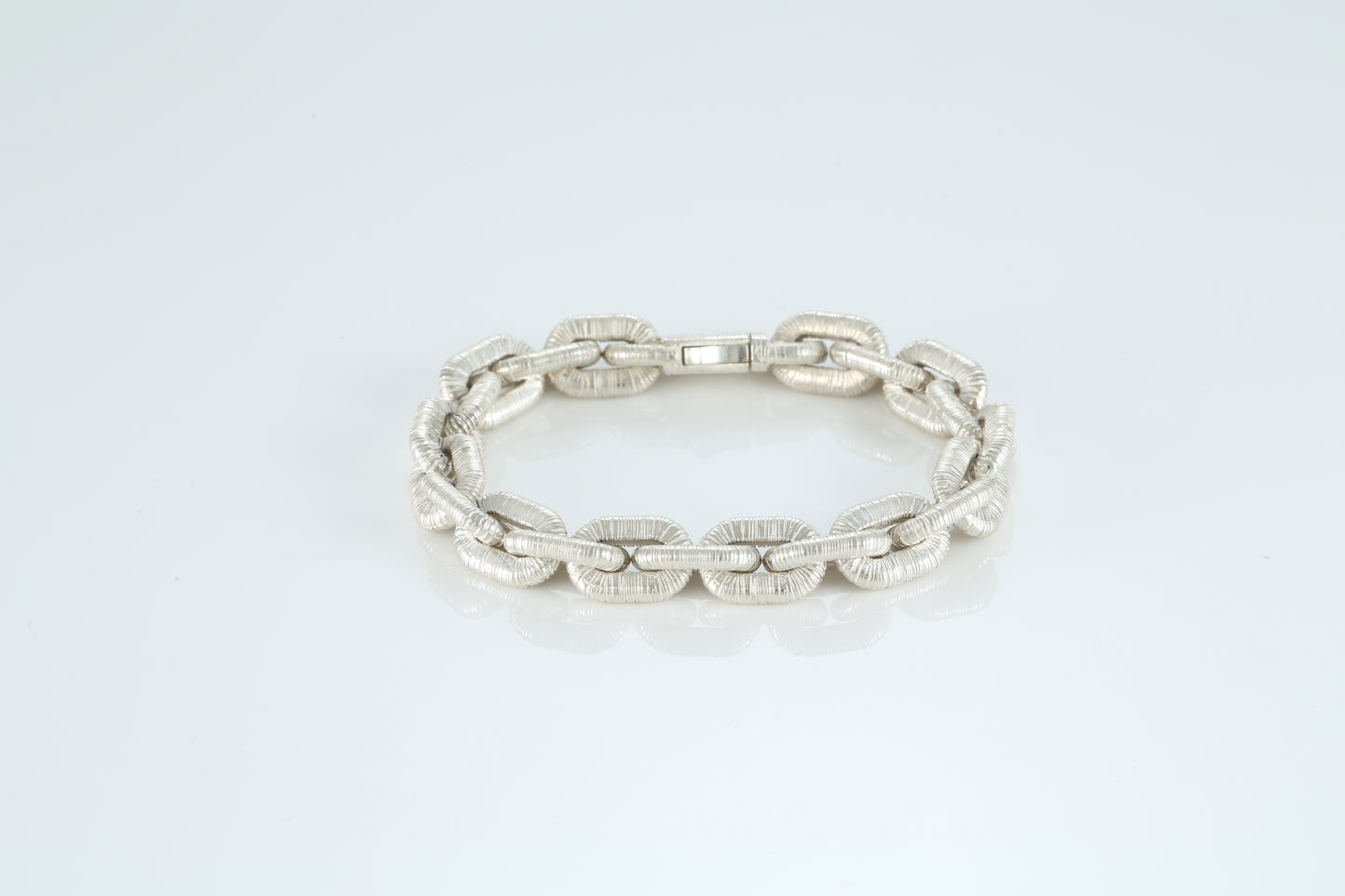 Sterling silver bracelet with textured links and anchor