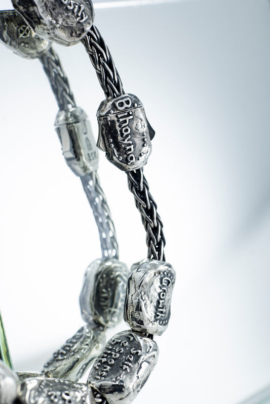 Bracelet with petroglyph beads, ethnic style jewelry.