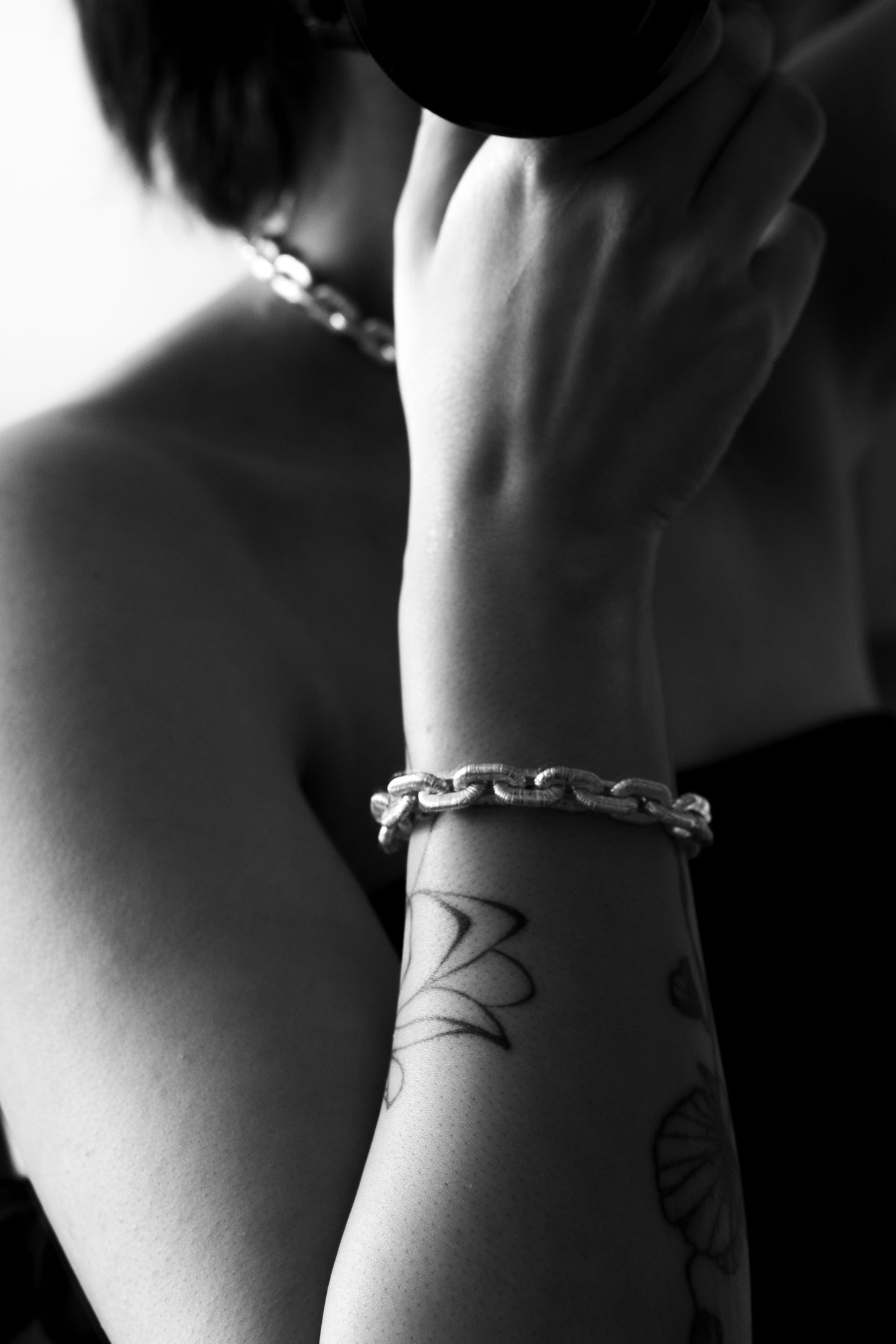 Sterling silver bracelet with textured links and anchor