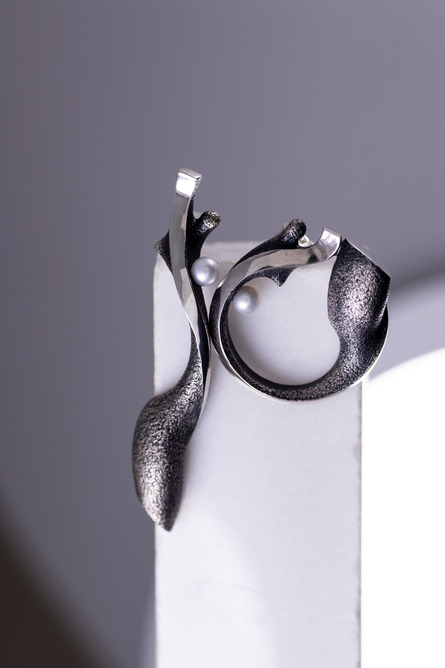 Handcrafted oxidized silver earrings with pearls – feminine silhouettes